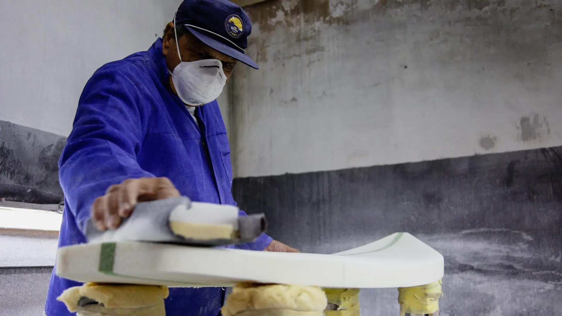 Paul Jeggels shaping a surfboard
